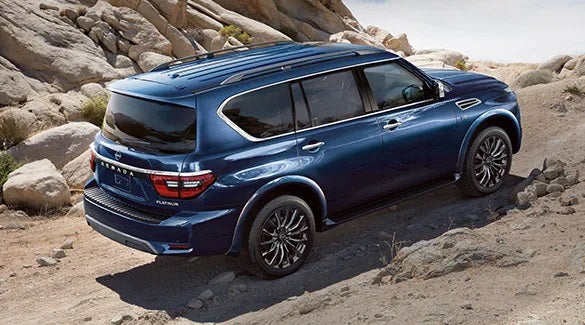 2023 Nissan Armada ascending off road hill illustrating body-on-frame construction. | Crossroads Nissan Wake Forest in Wake Forest NC